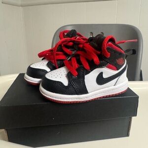 Nike Jordan  Kids Black, White, and Red Sneakers